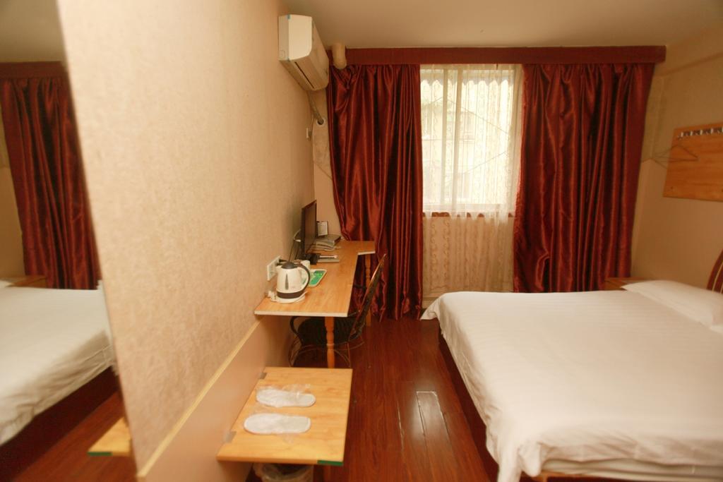 Zhengfu Caotang Decent Inn Chengdú Habitación foto