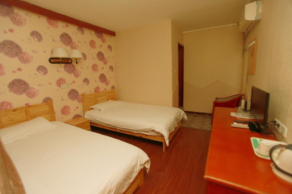 Zhengfu Caotang Decent Inn Chengdú Habitación foto